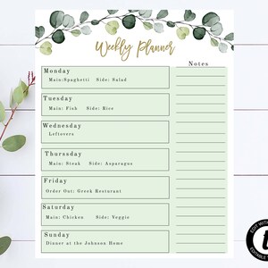 May include: A printable weekly planner with a green and white color scheme. The planner has a floral design at the top and includes sections for each day of the week, with spaces for meal planning and notes.
