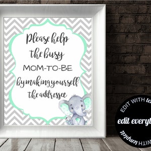 May include: A printable sign with a gray and white chevron pattern background. The sign has a green border and says "Please help the busy MOM-TO-BE by making yourself the addressee". A cartoon gray elephant with green accents is in the bottom right corner.
