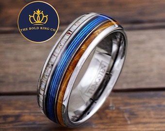 Fishing ring with moose antler, whiskey barrel wood, and blue fishing line