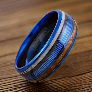 The Blue Angler. Blue Tungsten Ring with Deer Antler, Fishing Line, and Whiskey Barrel Wood Inlay, Men&#39;s Blue Fishing Wire Ring