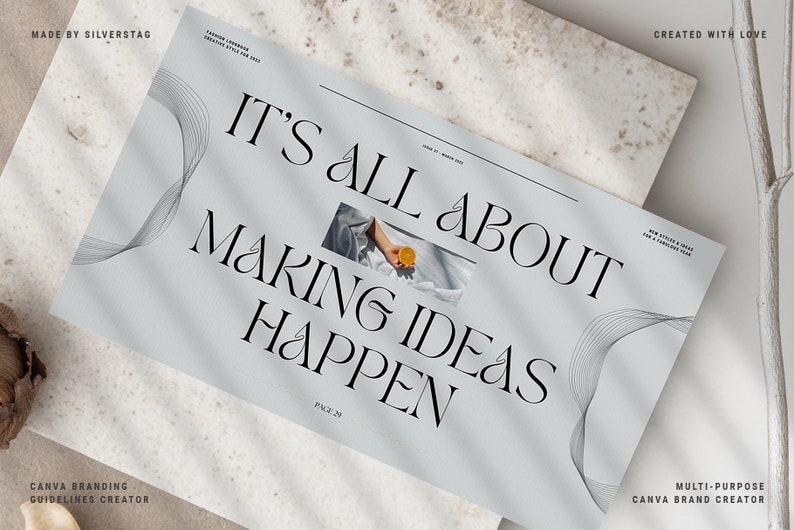 以下が含まれることがあります： 「IT'S ALL ABOUT MAKING IDEAS HAPPEN」という見出しが太字でエレガントなフォントで書かれた、明るい灰色の雑誌。画像には、柑橘系の果物を持っている手の小さな写真が含まれています。「MADE BY SILVERSTAG」というテキストが上部にあります。