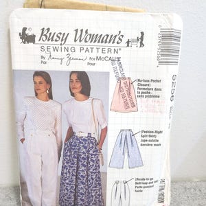 May include: A vintage sewing pattern labelled "Busy Woman's Sewing Pattern" by Nancy Zieman for McCall's. The pattern shows illustrations of women's clothing, including a split skirt and trousers. The package is white with black and blue text.