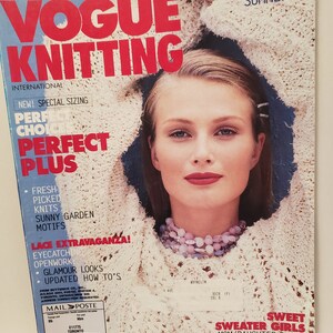 May include: Vogue Knitting magazine cover featuring a woman wearing a white crocheted sweater with a beaded necklace. The cover text reads "Spring/Summer '95" and "Sweet Sweater Girls Mom/Daughter Duets".