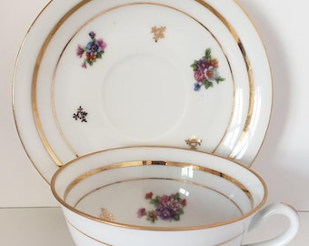 Vintage Limoges Tea Cup and Saucer: Floral Porcelain, Gold Accent