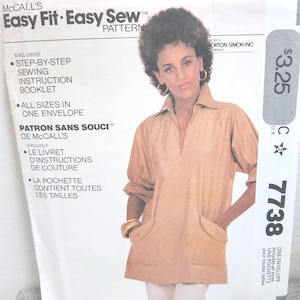 May include: McCall's Easy Fit Easy Sew pattern envelope. The package shows a woman in a tan tunic with pockets. The envelope includes step-by-step sewing instructions and is available in all sizes. The price tag shows £3.25.