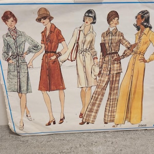 May include: A vintage sewing pattern for four different styles of dresses and pants. The pattern is for size 12 and includes a belt, hat, and other accessories. The pattern number is 2968.