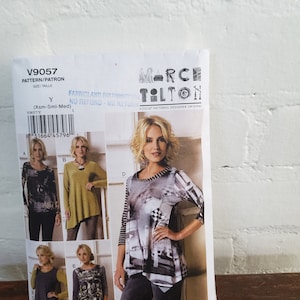 May include: A sewing pattern for a women's top with a variety of different styles. The pattern is from Vogue Patterns and is designed by Marc Tolton. The pattern number is V9057 and the size is Y (Xsm-Sml-Med).