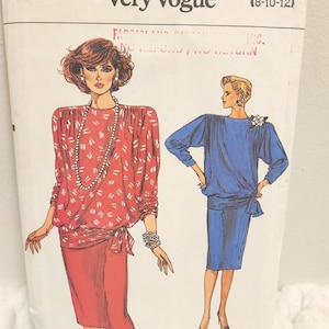 May include: A vintage sewing pattern titled "Very Easy Very Vogue" with illustrations of two women's outfits. The pattern number is 9314, and the size range is (8-10-12). One outfit is red with white accents, and the other is blue.