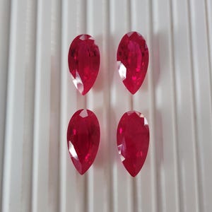 Lab Grown Ruby Pear Shape 4 Pieces Carat Weight 48.70 Size 20X10X7 MM Same Size