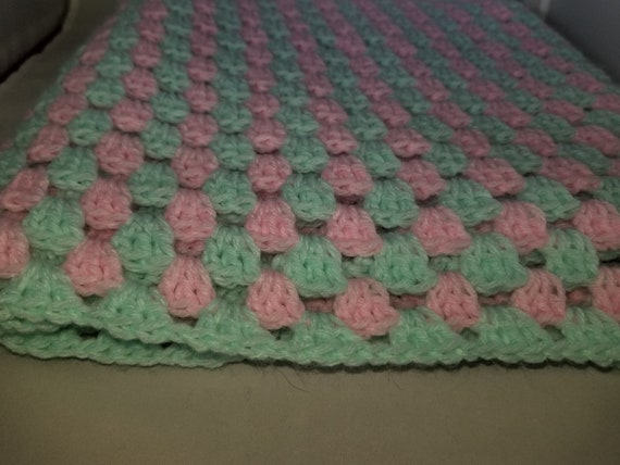 pink and green baby blanket