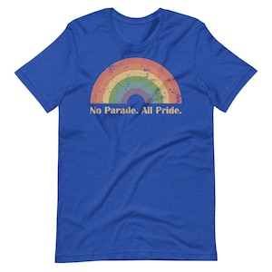 May include: A royal blue t-shirt with a rainbow graphic and the text "No Parade. All Pride."