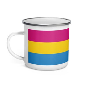 May include: White enamel mug with a pansexual pride flag design. The flag has three horizontal stripes: pink, yellow, and blue.