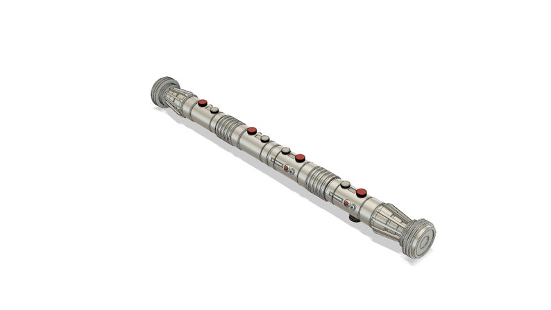 May include: A silver lightsaber hilt with red buttons. The hilt has a textured surface and a cylindrical shape.