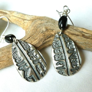 Handmade Hieroglyphic Sterling silver earrings adorned with fine twisted black glass beads and sterling ear wires...Beautiful gift for her!