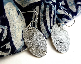 SOLD! Dangling, oval sterling silver earrings, handmade with a fine line Boho style design. Slightly domed. (SOLD)!