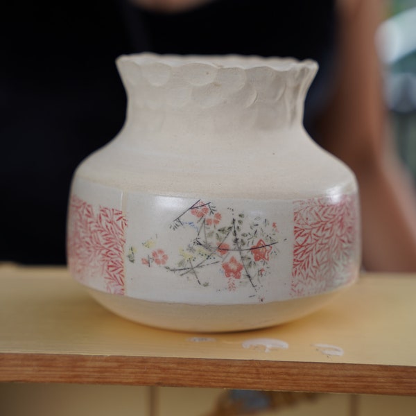 ceramic vase with flower and leaf print