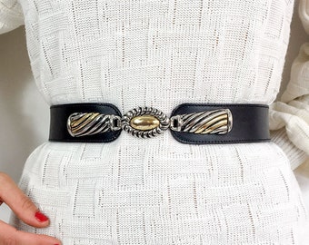 80s/early 90s vintage black leather belt. Two-strap closure with a gorgeous silver and gold-toned buckle.
