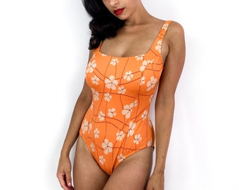 70s vintage retro print one-piece swimsuit. Floral print, bare back, quality fabric.