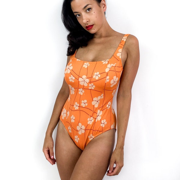 70s vintage retro print one-piece swimsuit. Floral print, bare back, quality fabric.