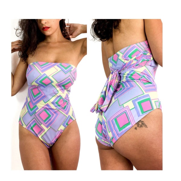 80s vintage strapless one-piece swimsuit. Big bow at the back. Pastel colors.