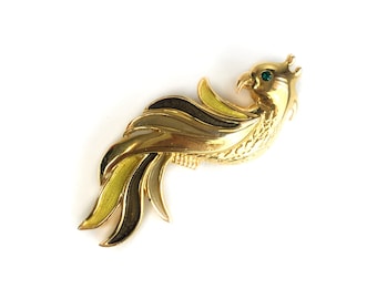 Vintage art deco-style "Bird of Paradise" pin/brooch. Tones of gold, yellow and brown with tiny green eyes.