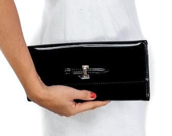 80s vintage black vinyl  clutch. Light and practical. Very chic.