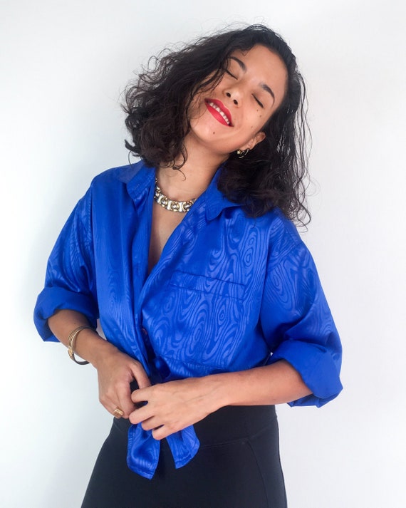 80s vintage royal blue blouse. Buttoned at the fro