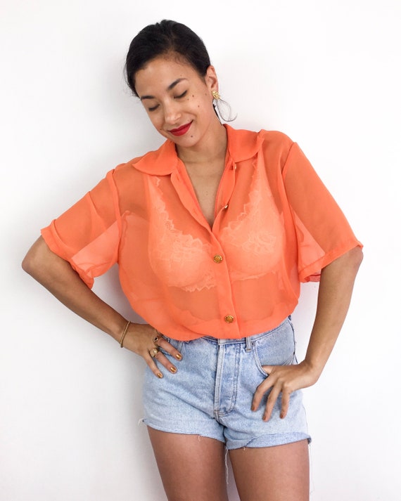 Shear orange vintage 70s short sleeve blouse with