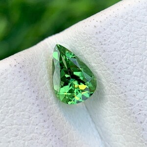 Pear Cut Tsavorite Garnet: 0.49 Carat Green Gemstone (6x4mm)