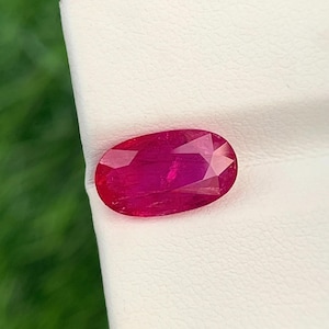 IGITL Certified 3.25 Carat Reddish Pink Ruby: Oval Cut Gemstone, 12x7 MM