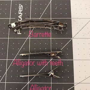 Clip types available to for hair bows. Barrette, alligator clip or alligator clip with teeth