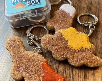 Dino Chicken Nugget Keychain with BBQ, Ranch, Sweet and Sour, Honey Mustard, Ketchup, or Hot Sauce