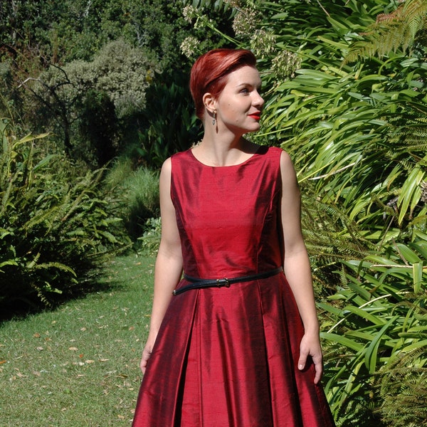 Bianca dress: Size 10 (UK/AU/NZ) This burgundy silk dress can be dressed up in many different ways.