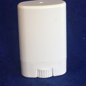 May include: White plastic deodorant container with a twist-up mechanism.