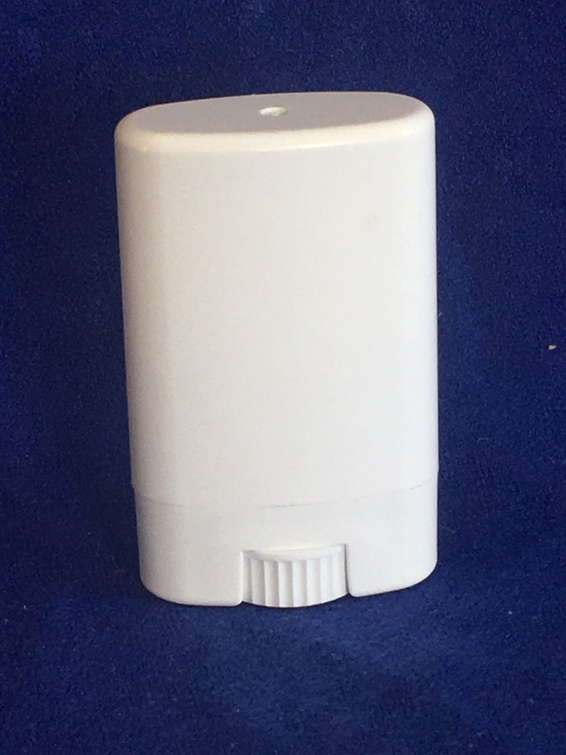 May include: White plastic deodorant container with a twist-up mechanism.