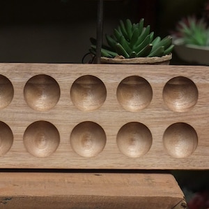 Bandeja de madera natural para guardar huevos