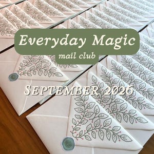 May include: A collection of white envelopes featuring a printed green and pink leaf pattern on the flap, sealed with a small green wax seal. The text Everyday Magic mail club and SEPTEMBER 2026 is printed over the envelopes in white and green.