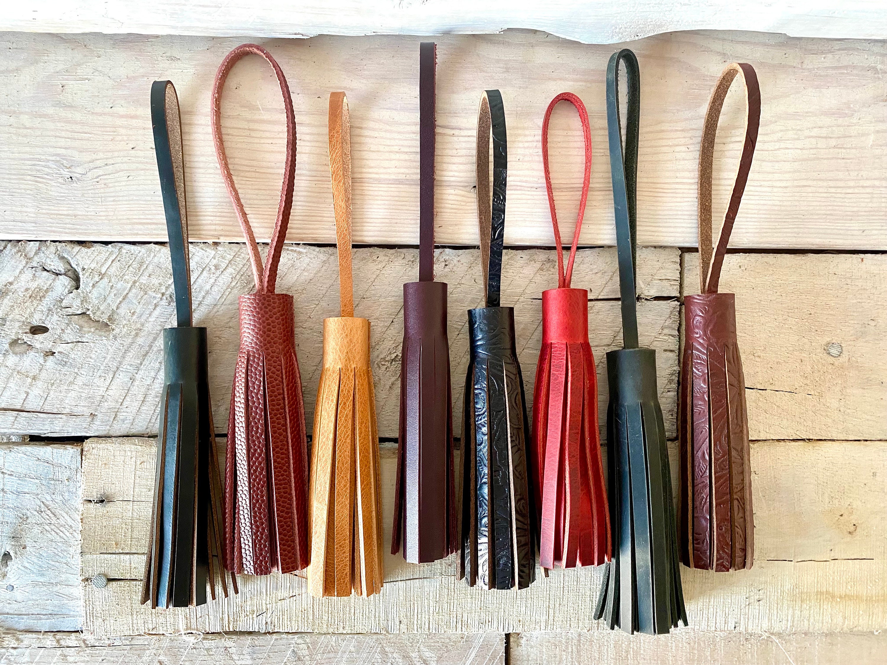 For sale! Bag is real leather and the tassels are real leather. # louisvuitton #louisvuittonrepurposed #tassel #tasselhandbag