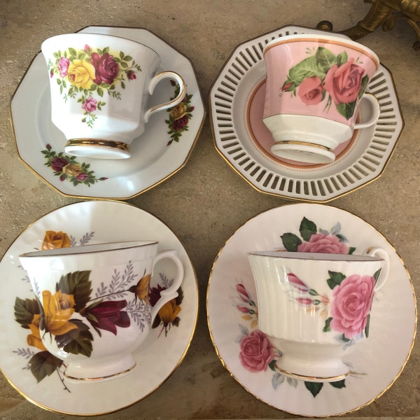 Set of 4  cups and saucers