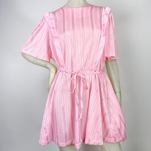 light pink pinafore dress Pink Ruffle Pinafore Dress with a twirl skirt and Ruffle hemline 6