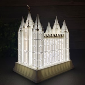 Estatua de luz nocturna del templo de los últimos días de Salt Lake City, Utah - LDS - La Iglesia de Jesucristo de los Santos de los Últimos Días