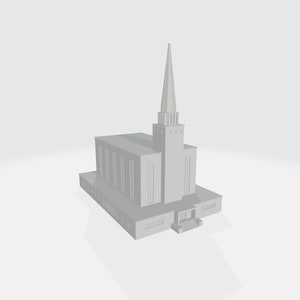 May include: A white, modern church building with a tall spire and a large entrance.