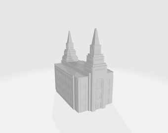May include: A white model of a church with two spires. The church has a rectangular base and a flat roof. The spires are tall and slender, and they have a pointed top.