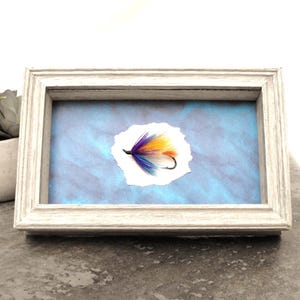 Framed fishing fly: Fishermen wall display, 7x4-3/8" shadow box, blue orange purple teal
