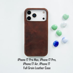 May include: A brown full-grain leather phone case for iPhone 17 Pro Max, 17 Pro, 17 Air, and 17 models. The case is shown on a white surface with colorful decorative stones. The text on the image reads: iPhone 17 Pro Max, iPhone 17 Pro, iPhone 17 Air, iPhone 17 Full Grain Leather Case.