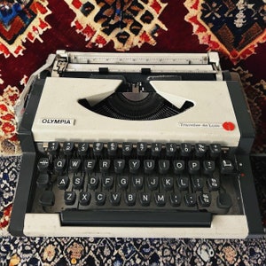 Vintage 1970s Olympia Traveller Typewriter