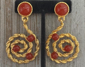 Vintage  1990&#39;s AVON Large Gold Swirl Carnelian Dangle Statement Clip Earrings With Orange Cabochons