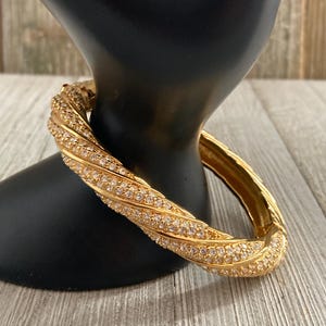 SWAROVSKI Vintage 1990&#39;s Classic Gold Hinged Bangle Bracelet With Rhinestones