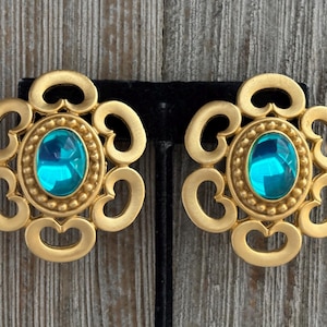 Gorgeous Vintage 1980&#39;s-90&#39;s Large Gold  Oval Swirl Modern Statement Clip earrings With Blue Cabochons