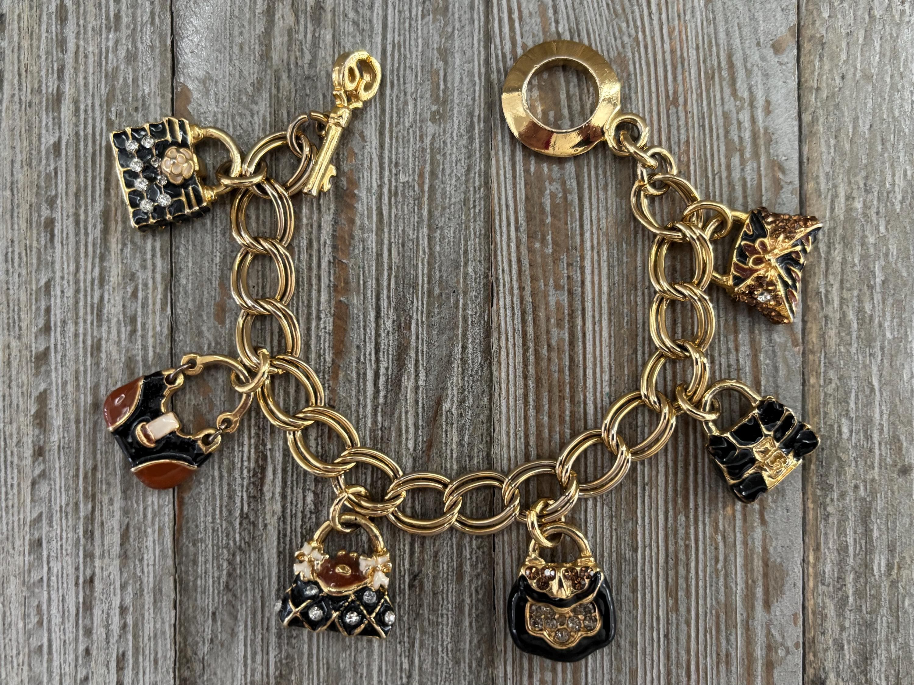 Bracciale con charms e diamanti